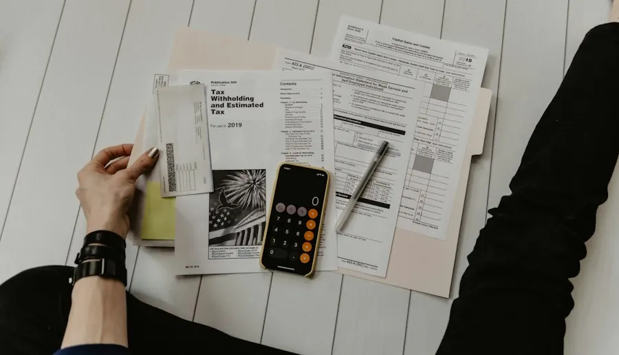 Financial statements, a calculator and a pen on a desk