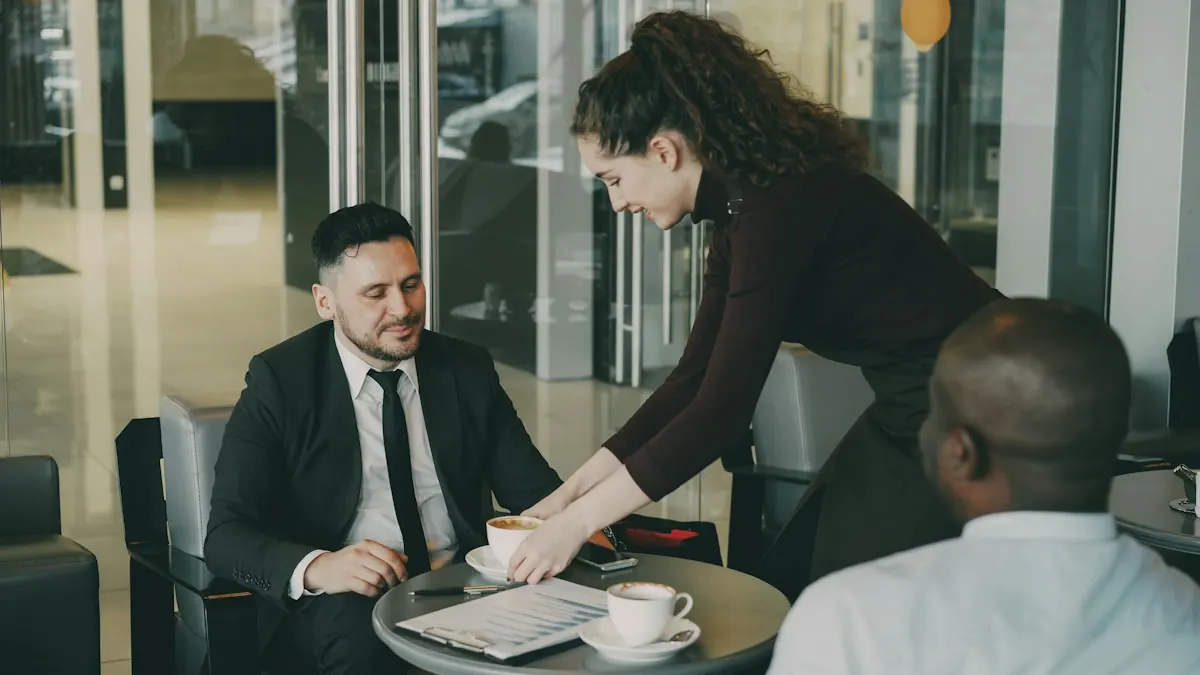 Two business owners talking over coffee at a cafe table